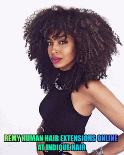 the young woman has an afro style hair