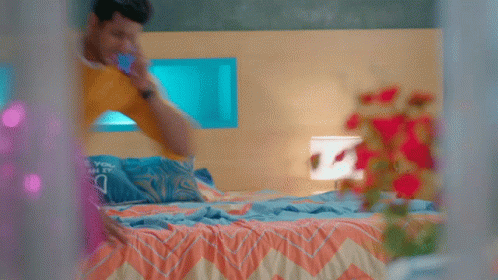 blurry po of a girl cleaning a bed