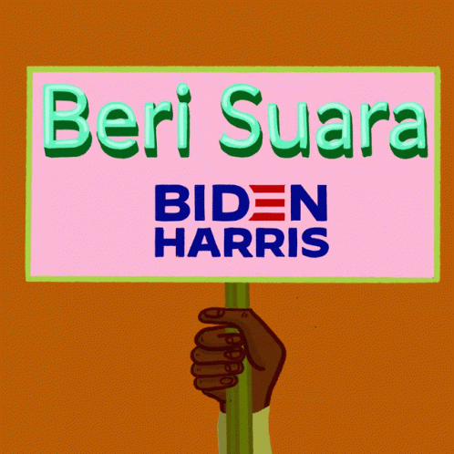 a hand holding a sign that says bert suara biden harns