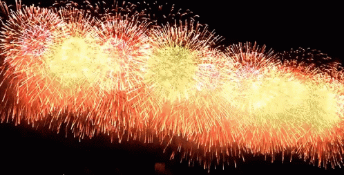 brightly colored fireworks exploding on a dark background