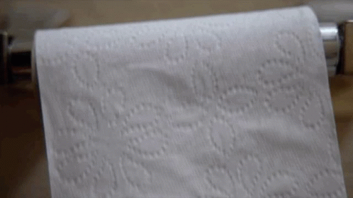 a very close up of an open toilet paper roll