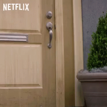 the word netflix on a door of an apartment