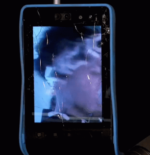 a cellphone with a reflection in the screen