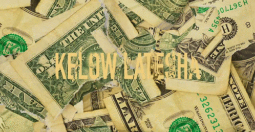 cash bills cut into pieces with the word kelow law printed on top