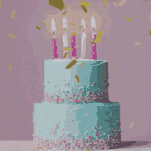 a yellow cake with five purple candles on top of it