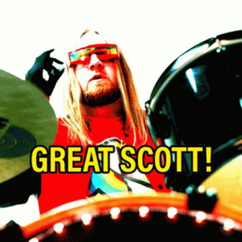 an image of a person wearing glasses with text reading great scott