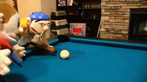 a pool table with several cartoon figures and a ball