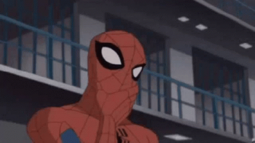 the animated spider man stands in a building