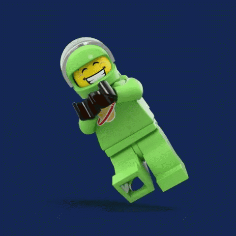 lego man in an odd green outfit holds a gun