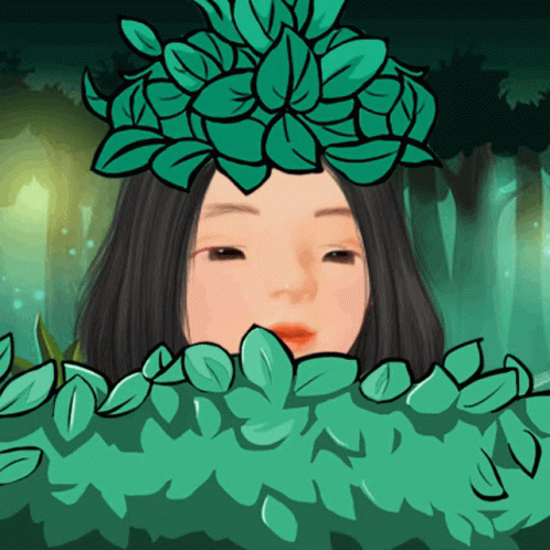 a woman with a wreath of leaves on her head in a forest