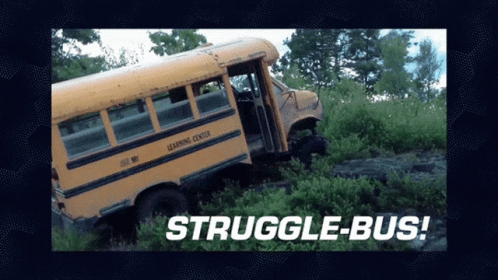 a bus stuck in the bushes in the dirt
