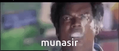 a blurry man's face has words on it that read nunaisr