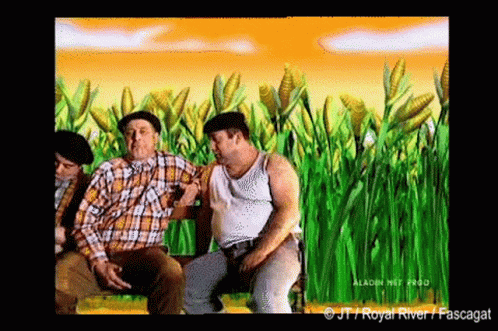 three men sit in front of the painting of corn