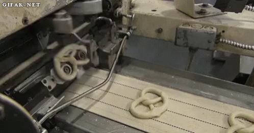 an industrial machine with two large circles on it