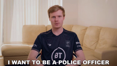 a young man sits in front of a tv set with the text i want to be a police officer