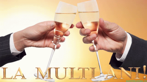 two people holding glasses of champagne with a background for a special event