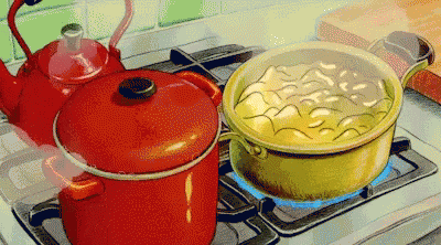 blue kettles on stove with a yellow pan on top