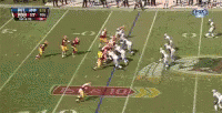 a video game of a football game with two teams in action