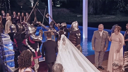 a newly married couple is being married to knights