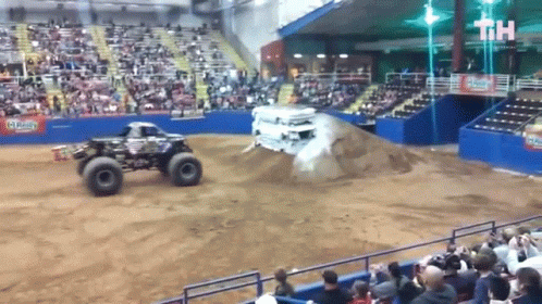 a monster truck on a stadium track