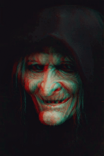 a person wearing a fake creepy smile and making a face