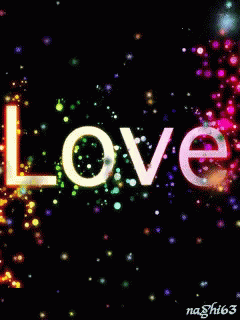 love lettering made of blurred bubbles with multi - colored lights