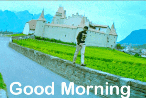 a man with his hand on the wall and text saying good morning