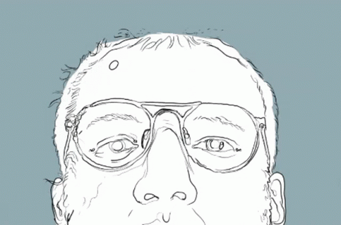 a close up po of a person with glasses