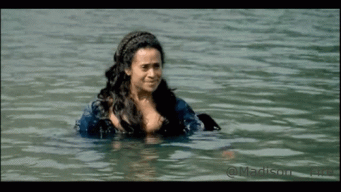 a woman with ids in a body of water