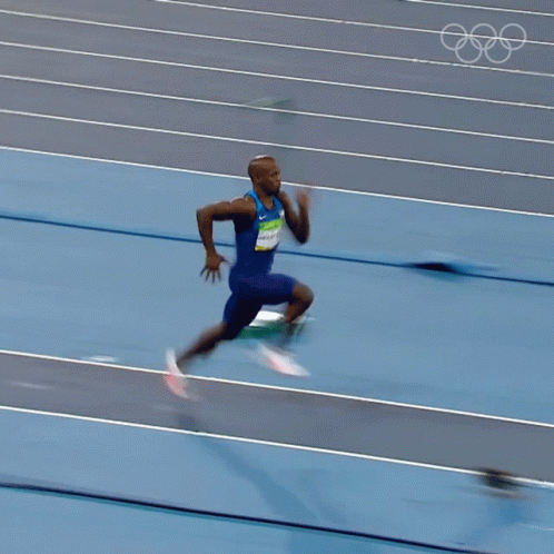 this is an image of a man running on the track