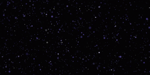 a black background with dots that look like snow