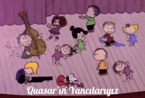 peanuts dancing in front of children in the stage