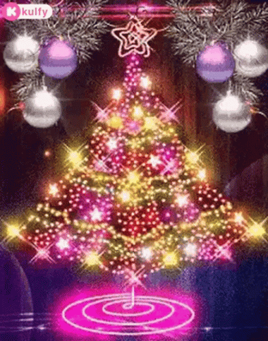 a colorful christmas tree with lightening and ornaments