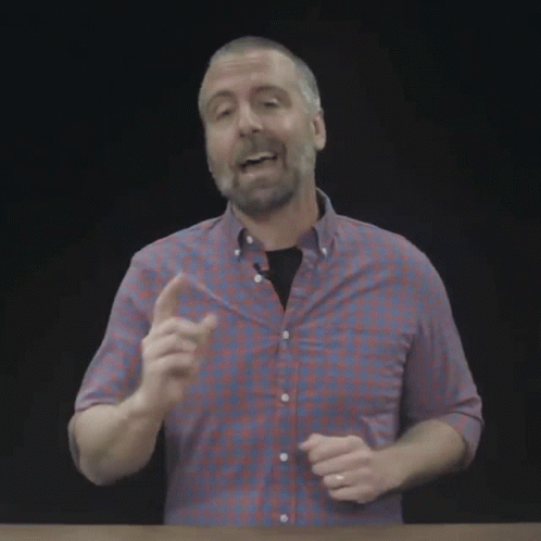 a man giving a presentation on a screen