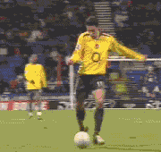a blurry po of a soccer player in action