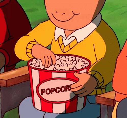 a cartoon picture of a boy holding a big bucket of popcorn