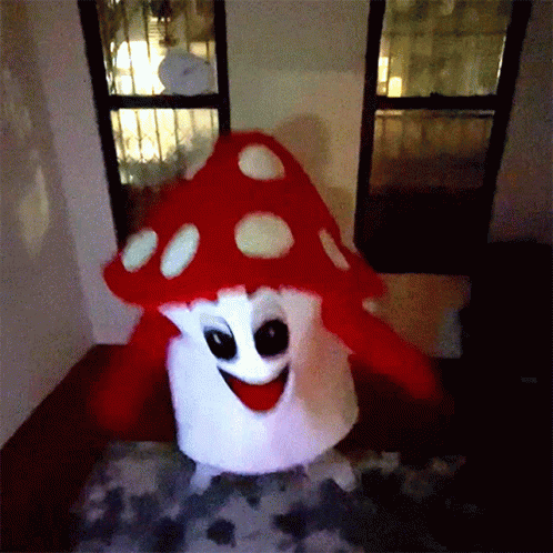 a giant mushroom is sitting on the table in front of the window