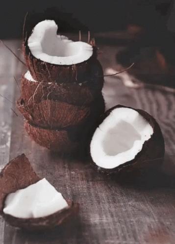 several coconuts sit together on a table