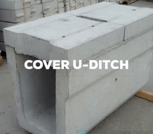 a cement box sitting on top of a warehouse floor