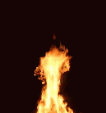 a very blue fire with flames coming out of it