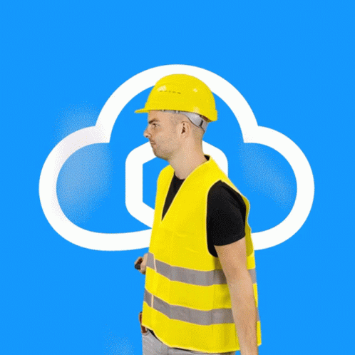 a man in a blue hat is standing near a cloud