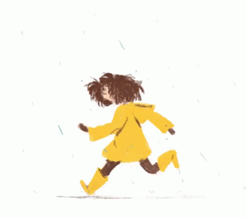 a blue shirted woman running in the rain