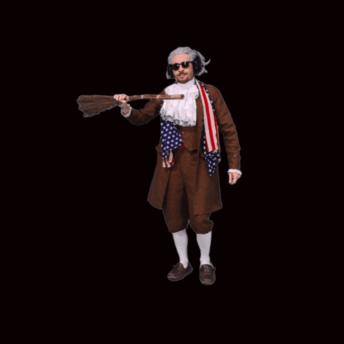 a man with glasses and an odd outfit and holding a gun