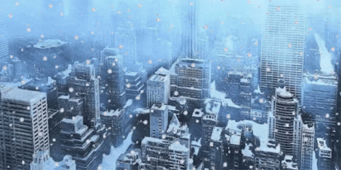 an image of an urban city that is covered in snow