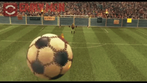 a screens of a soccer ball in the middle of an arena