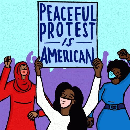 three black women holding a sign saying peaceful protest against american