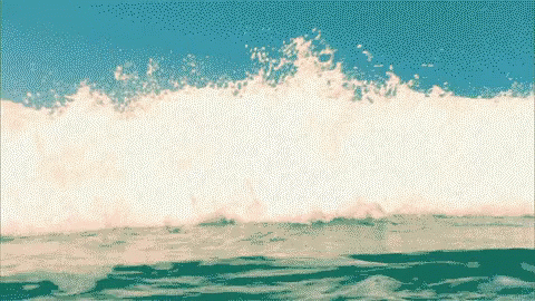 a person surfing a wave on the ocean