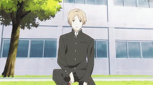 anime character in black clothes sitting on grass