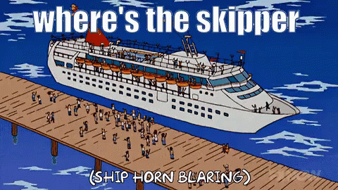 the ship is docked with people in the water