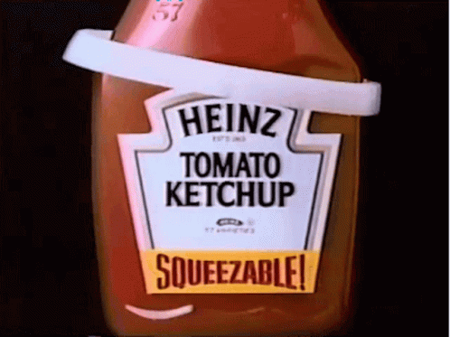 a bottle of heinzz tomato ketchup with an opening door